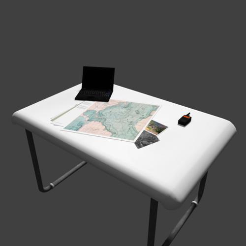Table with laptop, radio and documents preview image